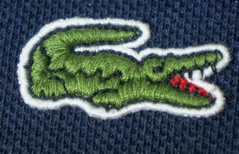 lacoste original vs logo.